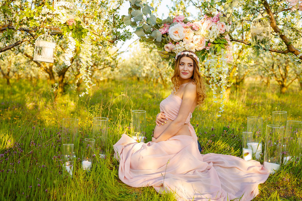 Pregnant Woman Posing Outdoors. Maternity Shoot